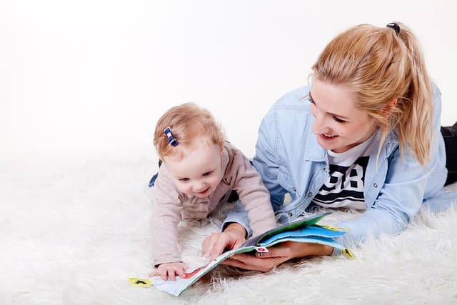Mother with baby celebrating